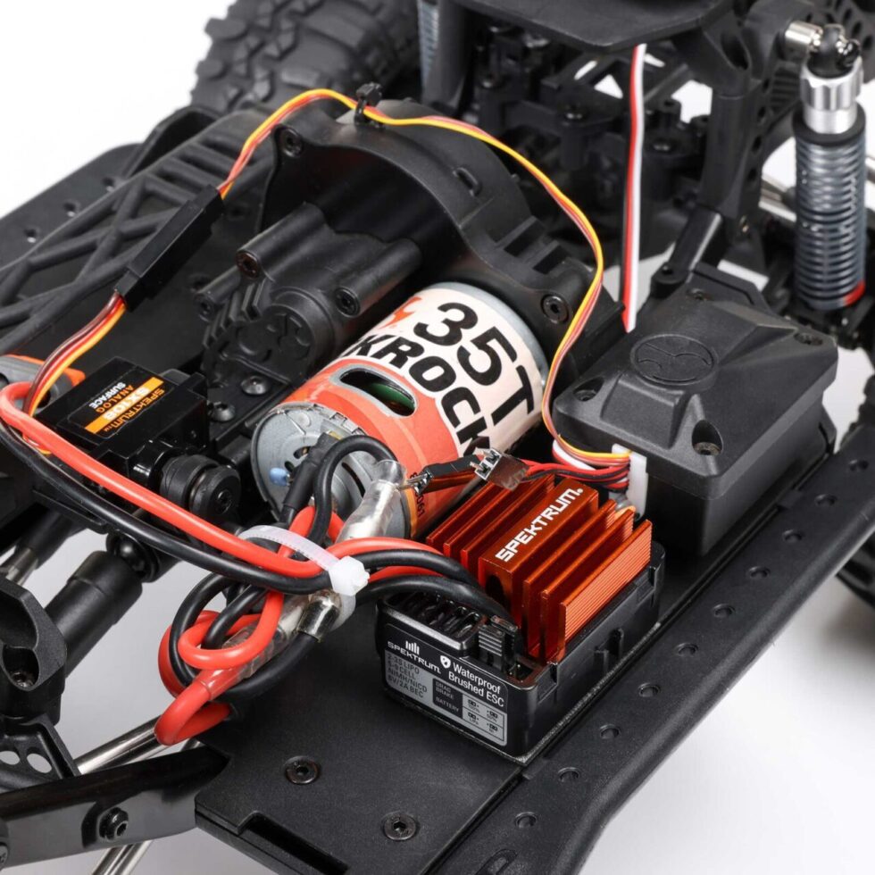 รถสเกลพร้อมเล่น AXI-2062T2 : AXIAL รถสเกล 1/10 SCX10 III 1987 Toyota SR5 4x4 RTR (มอเตอร์ Brushed) สีแดง - Image 17